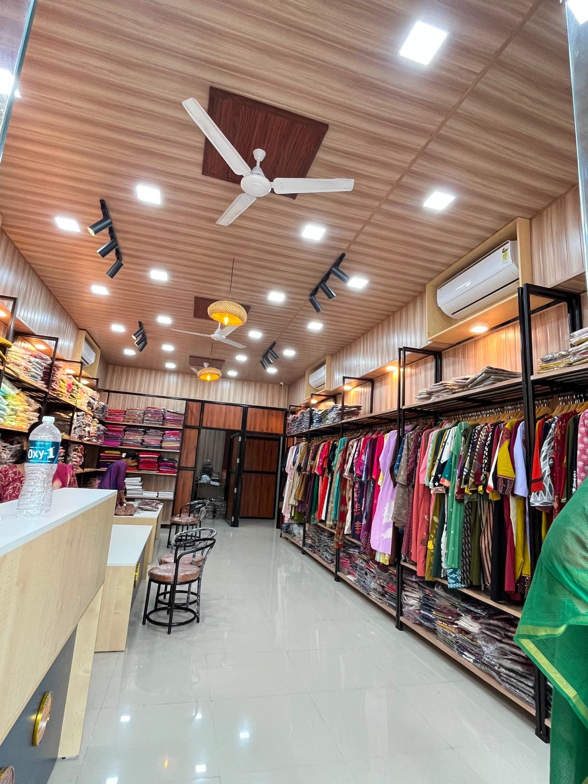 The store’s arched fabric display, navy ikat print
